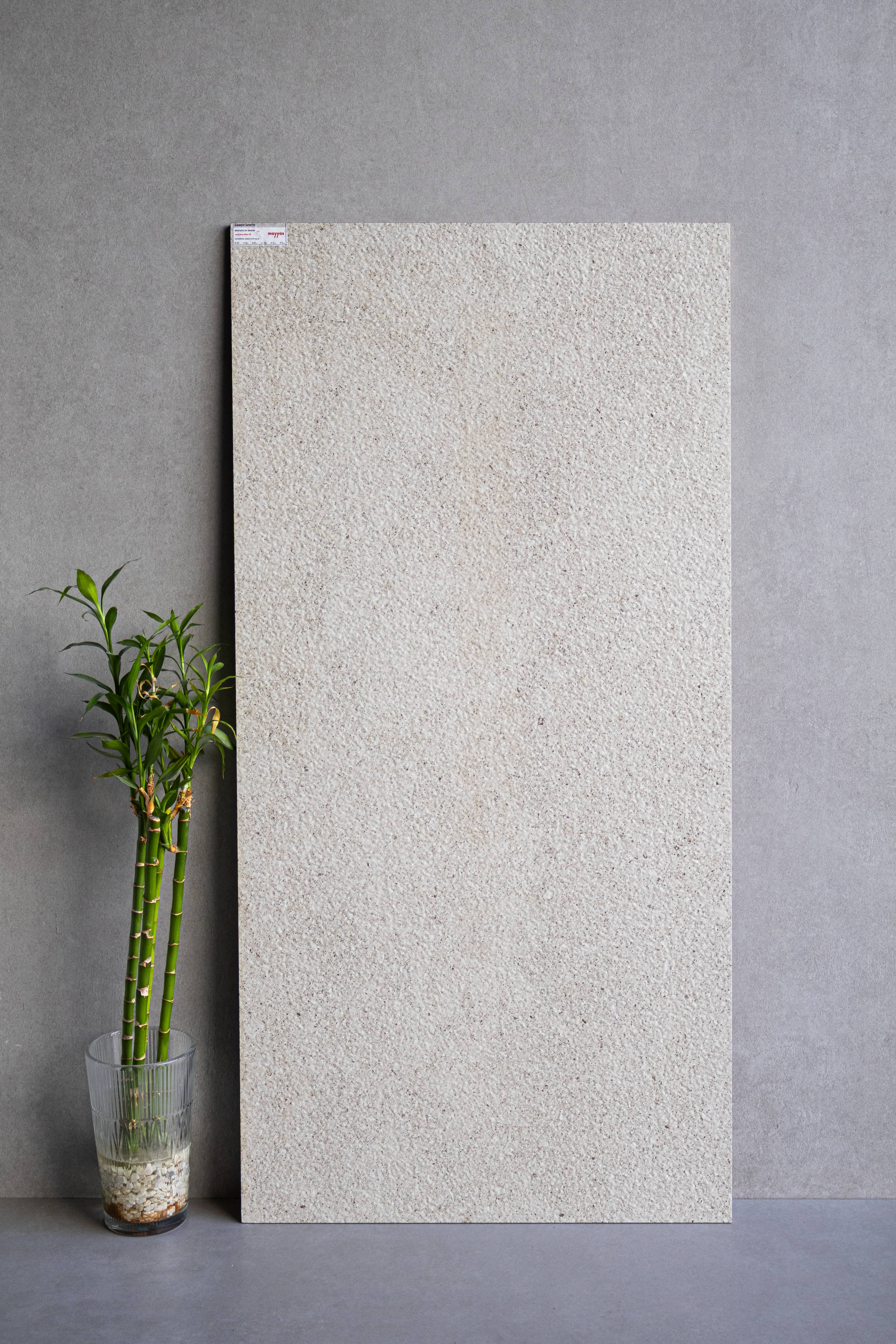 Discover SANDY WHITE large format porcelain tile 600x1200mm with matt finish and 9MM thickness. Durable, scratch-resistant, and perfect for elegant, low-glare flooring and wall solutions.